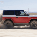 2025 Ford Bronco driving through dirt in the desert