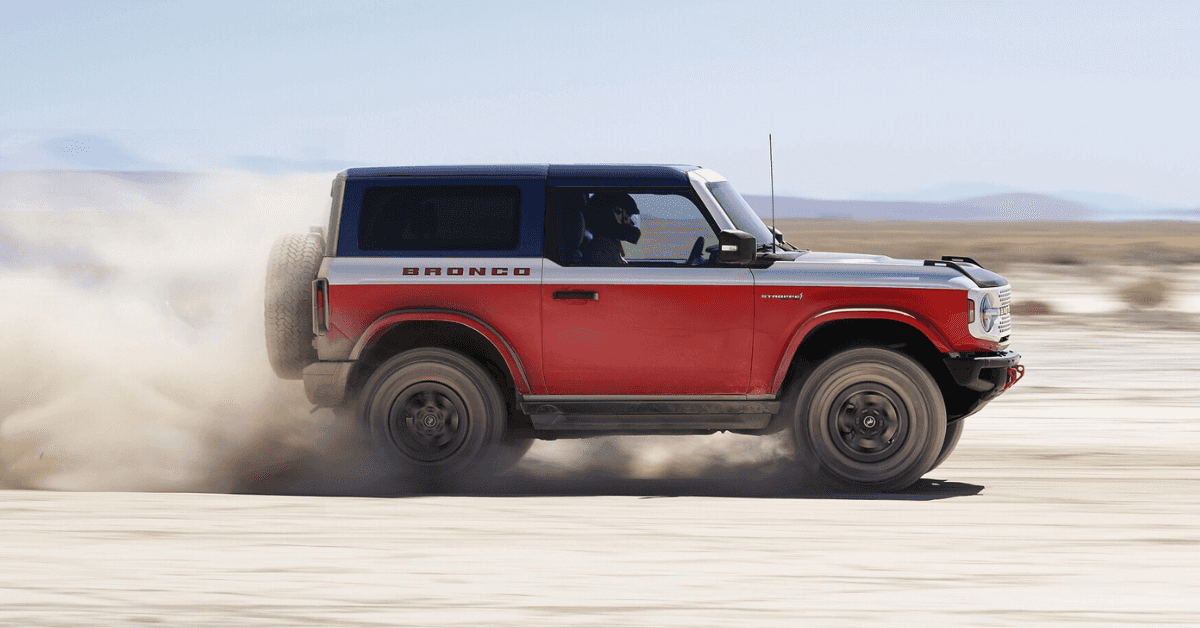 2025 Ford Bronco driving through dirt in the desert