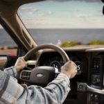 a man driving the 2025 Ford F-150