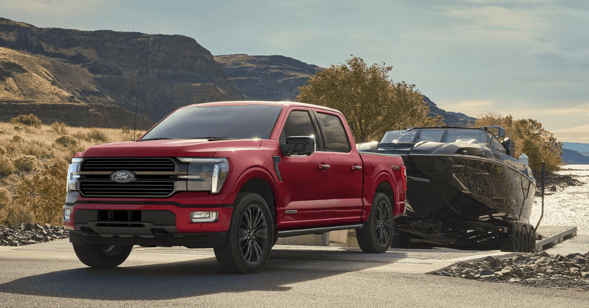 Ford F-150 Truck towing a boat out of a boat