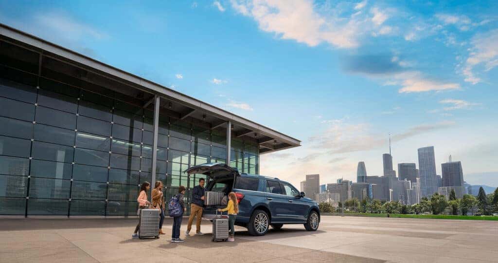 2024 Ford Expedition at airport with family unloading luggage