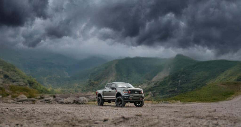 Ford Black Widow Limited F-150 parked in the mountains during a storm.
