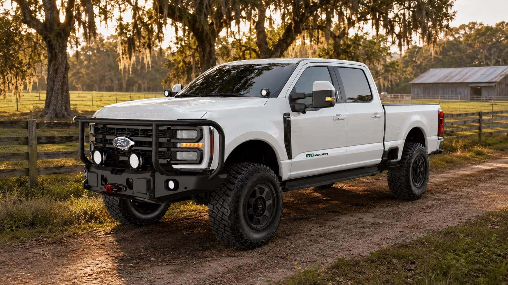 Ford AGwagon Super Duty parked on a Lowcountry farm near Savannah, Georgia, with pasture fencing and live oak trees.