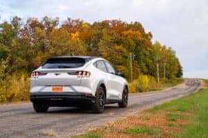 Back of Ford Mustang Mach-E on scenic road