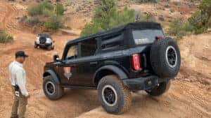 Ford Bronco at Off-Roadeo Adventure in Moab, Utah going down a hill