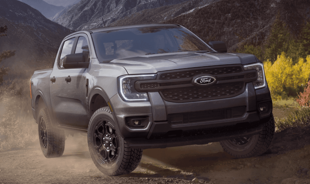 Ford Ranger in Grey Driving through Forest