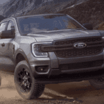Ford Ranger in Grey Driving through Forest