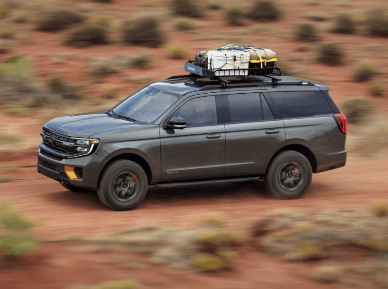 Ford Suv driving in desert