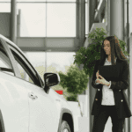 Woman standing near vehicle