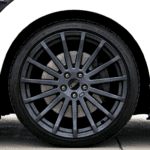 Side profile of tire with black rims