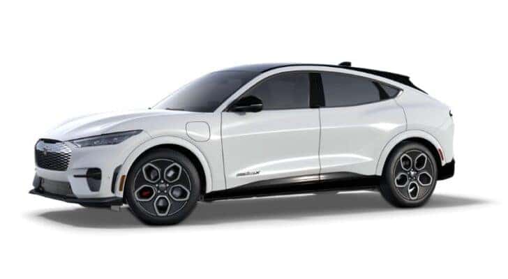 A white 2025 Ford Mustang Mach-E is angled left.