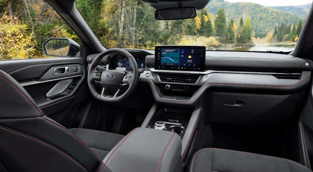 The black interior of a 2025 Ford Explorer ST is shown.
