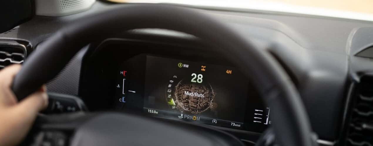 A close up shows mud/ruts mode on the digital gauge in a 2025 Ford Ranger.