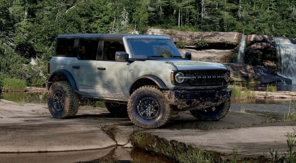 A grey 2025 Ford Bronco for sale near Alpharetta from the side.