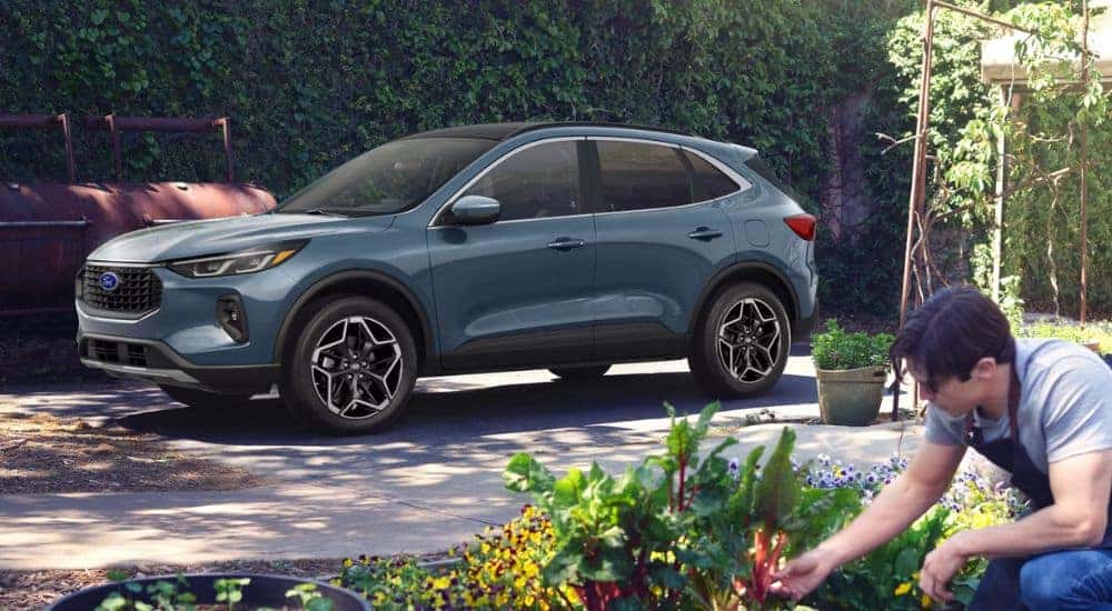 Blue 2026 Ford Escape parked in a driveway.
