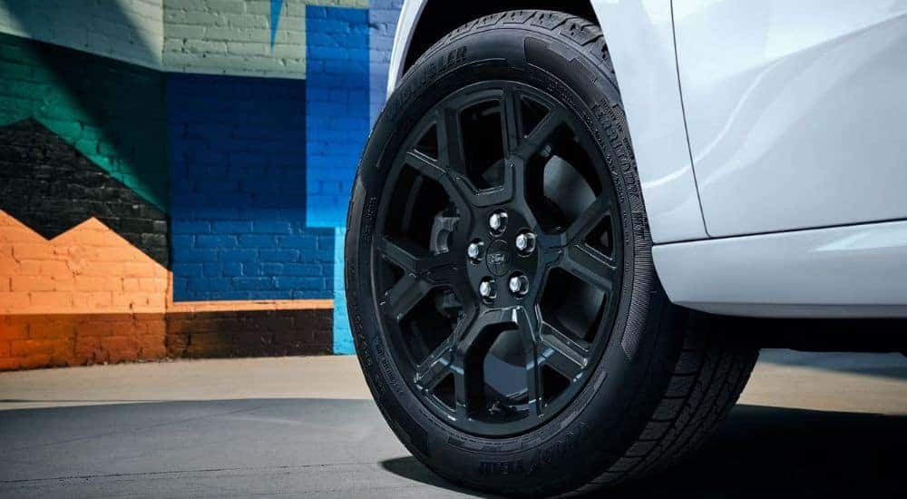 Black wheel base on a white 2026 Ford Maverick Lobo.