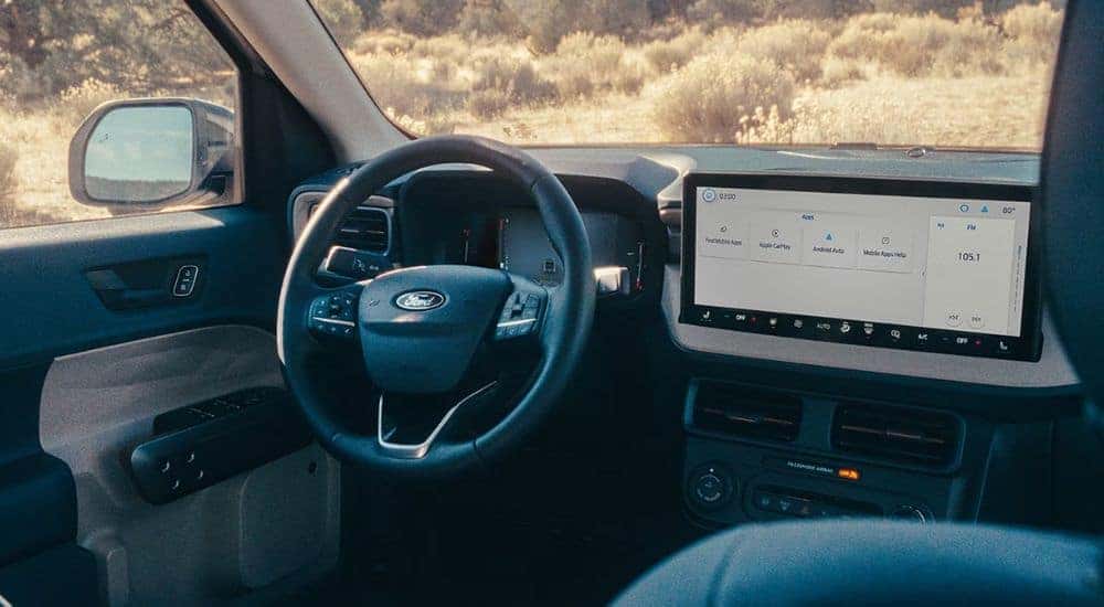 Infotainment display and steering wheel on a 2026 Ford Maverick.