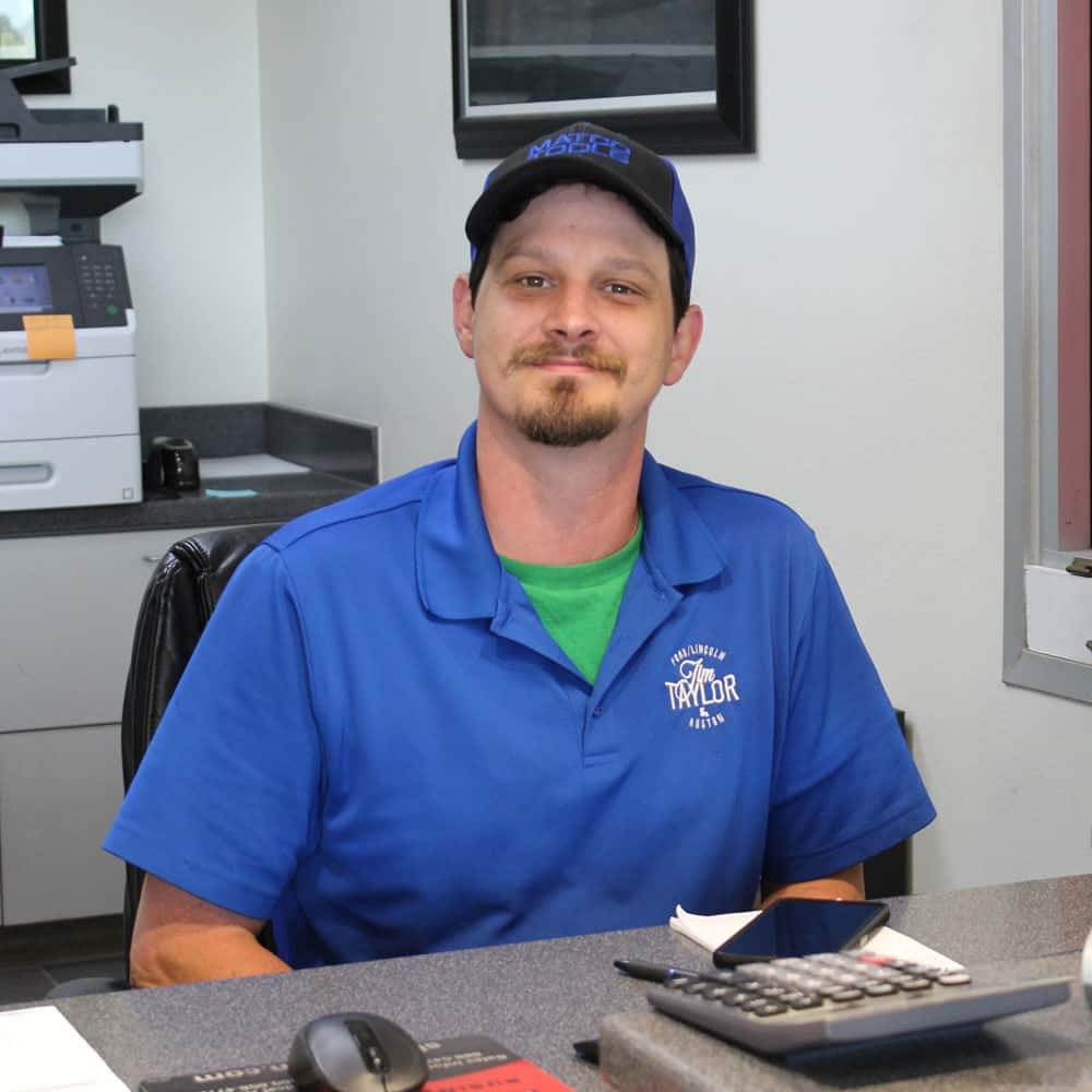 Parts Employee at computer