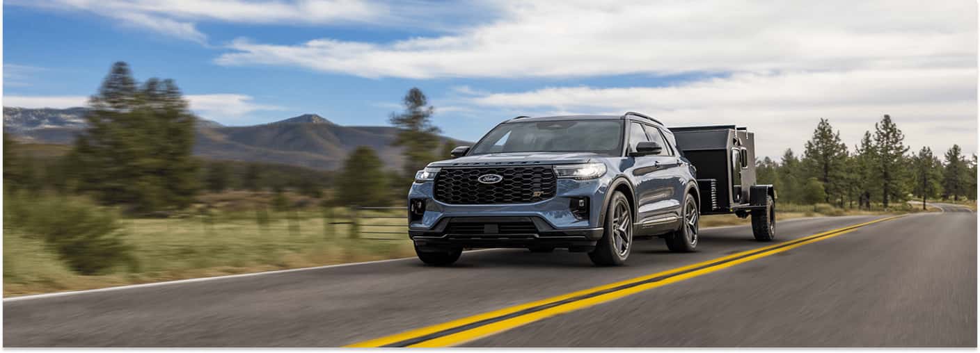 2026 Ford Explorer Towing Trailer on Road