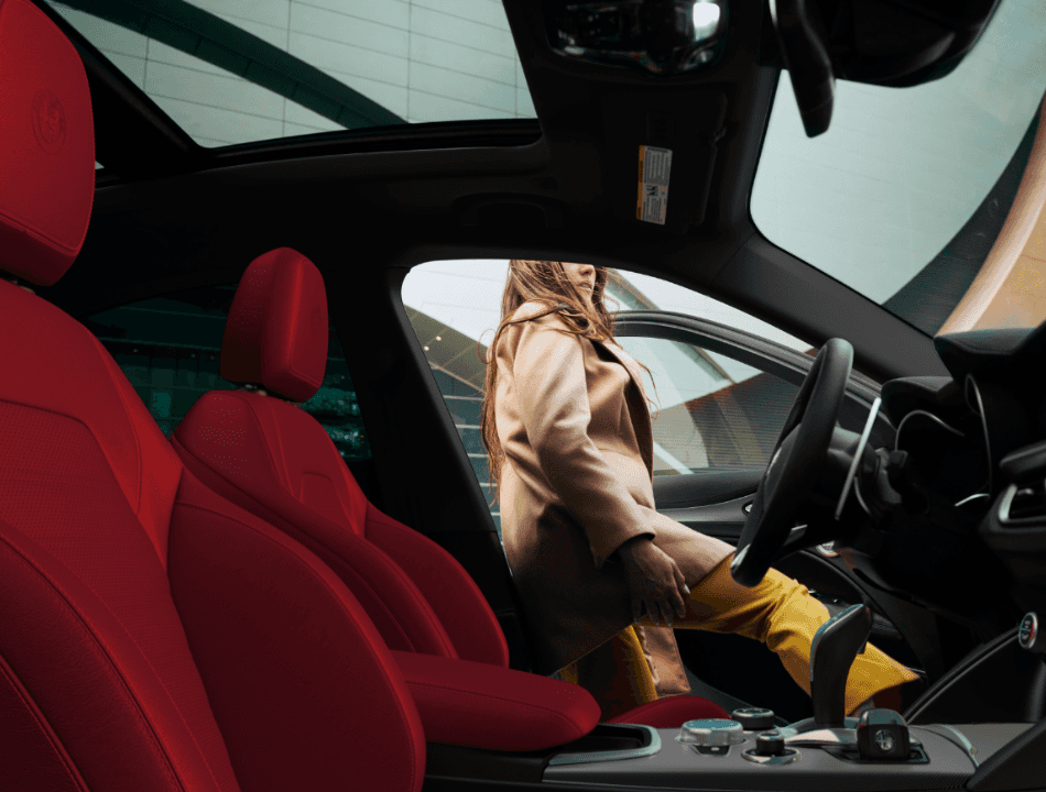 Woman getting into a car