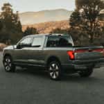 A grey 2023 Ford F-150 Lightning is shown parked on pavement after visiting a Ford dealership serving Athens, GA.