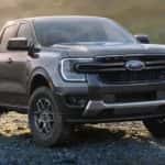 A grey 2024 Ford Ranger is shown parked near a lake after leaving a Snellville Ford dealer.