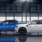 A blue 2025 Ford Maverick Tremor and white Maverick Lobo are parked in a garage.