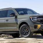 A green 2025 Ford Expedition Tremor is parked on a rock after leaving a Ford dealer near Decatur.