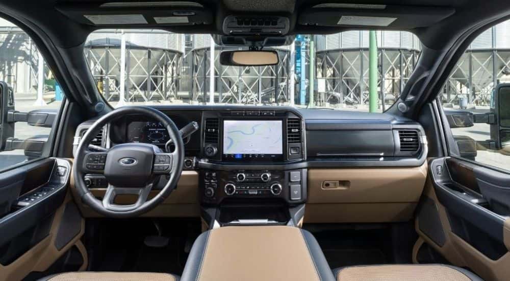 Brown leather upholstery in the cabin of a 2025 Ford F-250 Lariat.