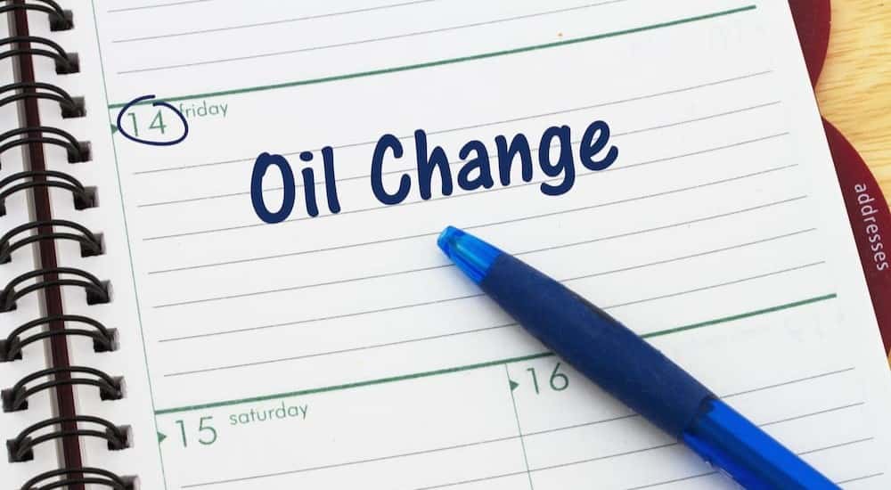 The words "oil change" written on a calendar.