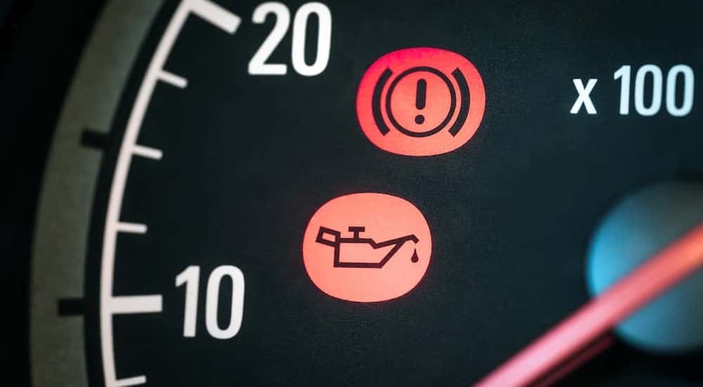 An oil emergency light is shown on the dash.