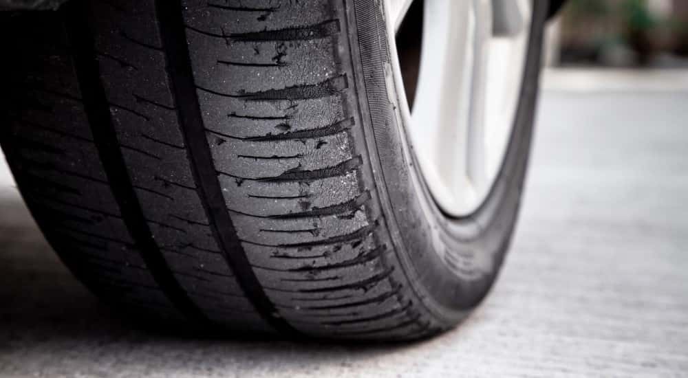 A close up of a worn tire.