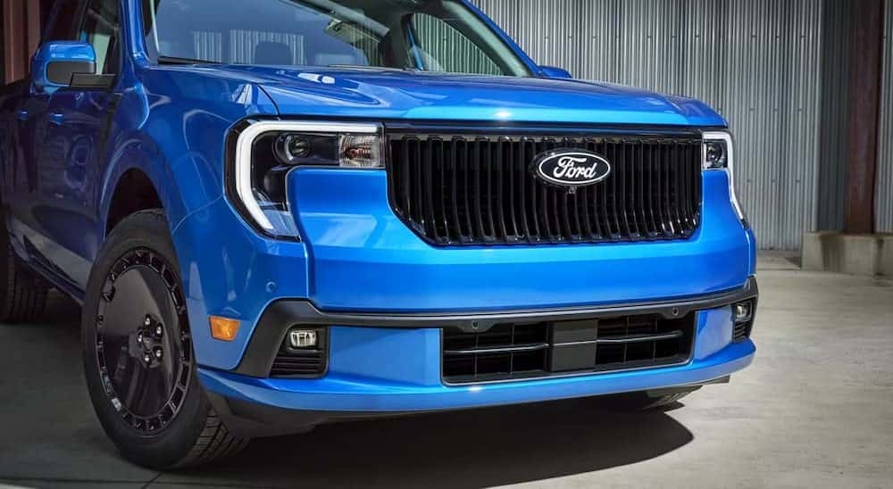 Close-up of the front end on a blue 2025 Ford Maverick Lobo for sale near Lawrenceville.