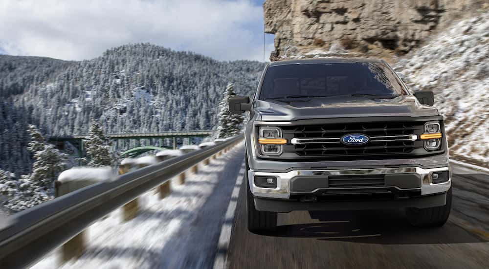 2025 Ford F-150 driving up a mountain road head on.