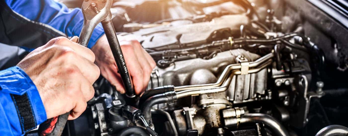 A mechanic performing transmission repair near Snellville