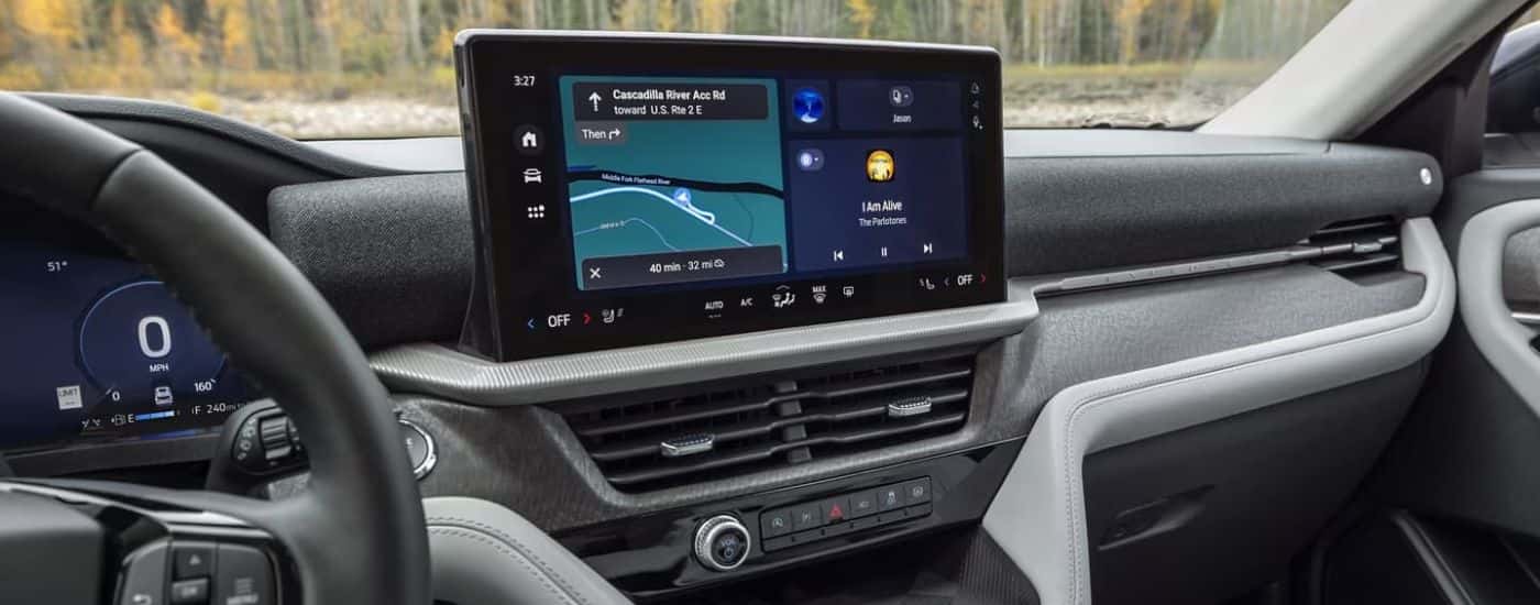 Infotainment and digital gauge cluster on a 2025 Ford Explorer for sale in Loganville