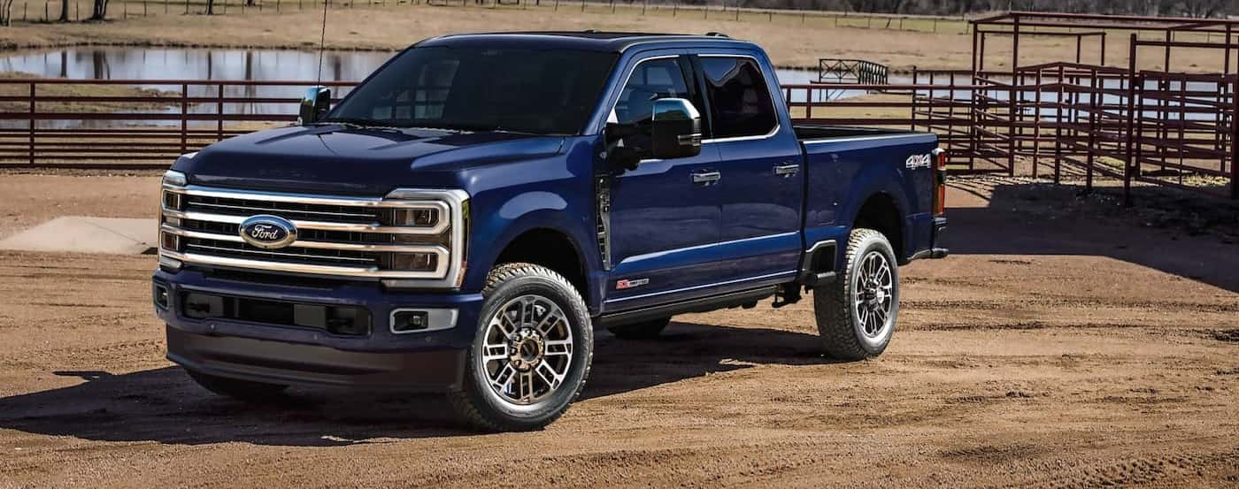 A blue 2026 Ford F-350 parked on a ranch.