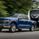A blue 2026 Ford F-150 towing a camper