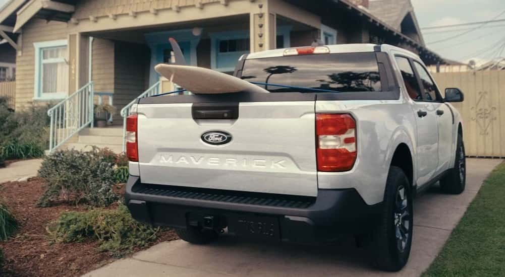 A white 2026 Ford Maverick parked in a driveway.