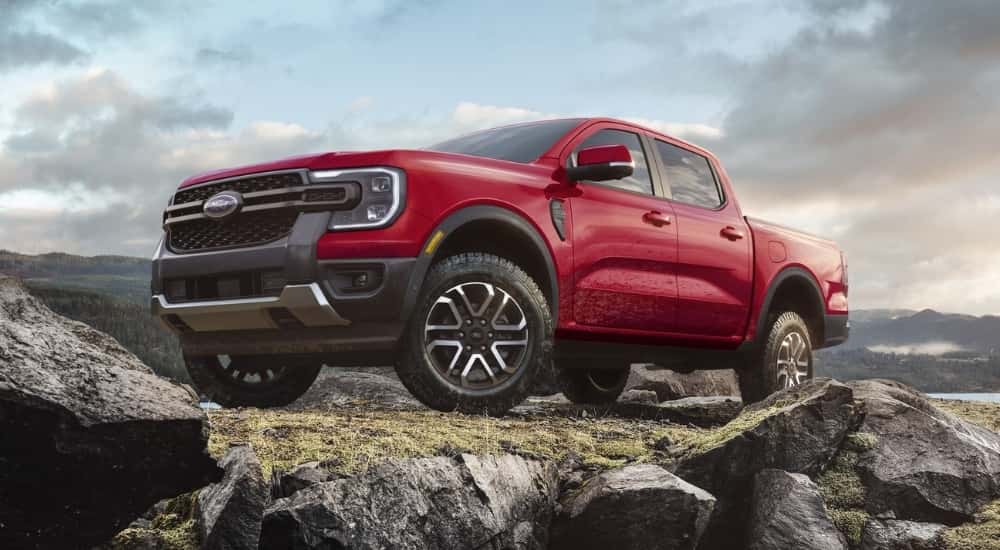 A red 2026 Ford Ranger Lariat parked off-road