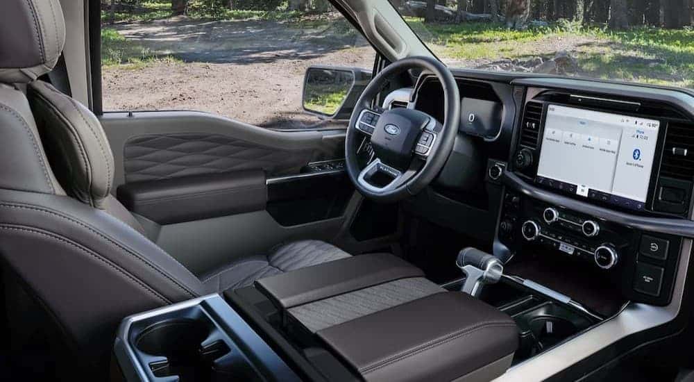 Black and gray interior and dash in a 2026 Ford F-150 for sale near Covington.