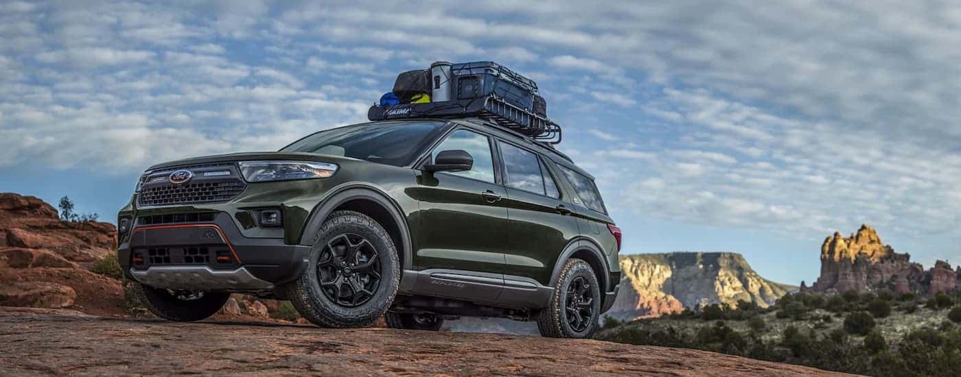 Green 2022 Ford Explorer Timberline parked off-road