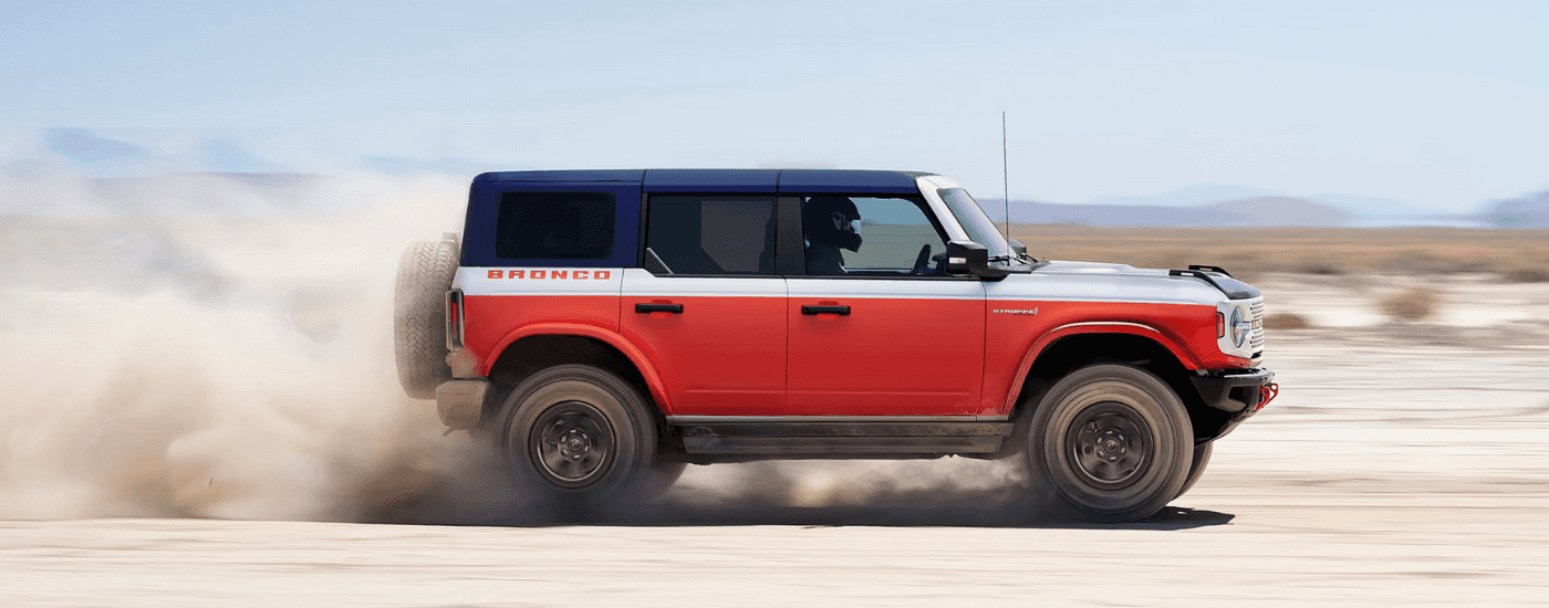 Red, white and blue 2026 Ford Bronco Sport Stroppe driving off-road