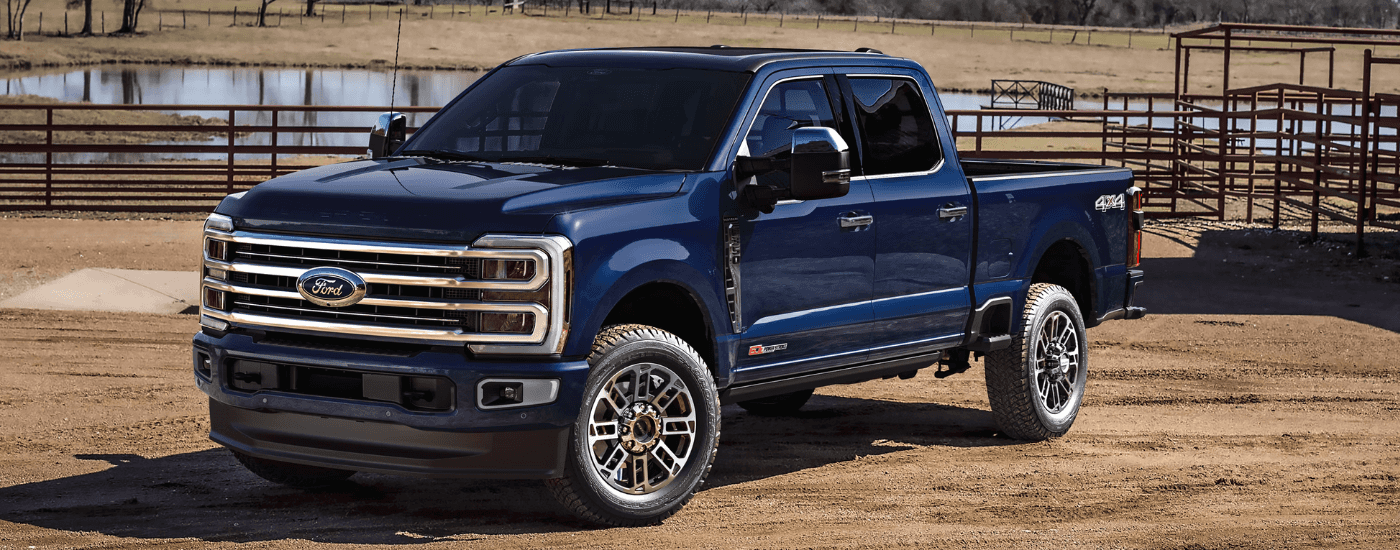 Blue 2026 Ford F-250 Super Duty parked on a ranch