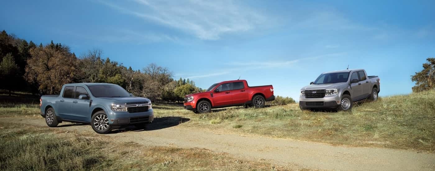 A blue, red and gray 2022 Ford Maverick Lariat & XLT & XL trio.