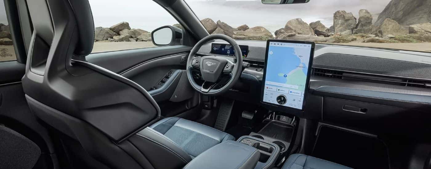 Infotainment display and steering in a 2026 Ford Mustang Mach-E.