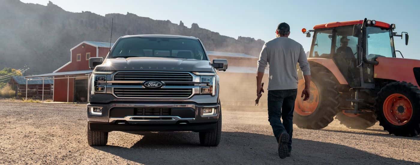 Grey 2026 Ford F-150 Platinum on a farm