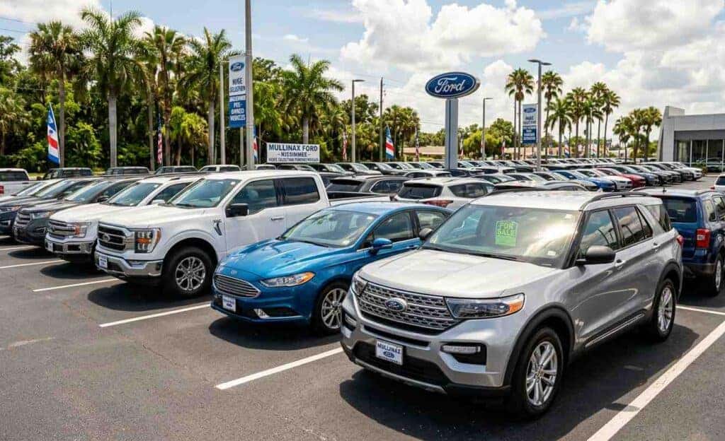 Wide view of the new and used vehicle inventory at Mullinax Ford of Kissimmee, featuring Ford trucks, SUVs, and cars with Up Front® Pricing and no dealer fees.