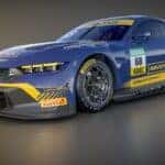 a blue and yellow Mustang GT3 DTM vehicle