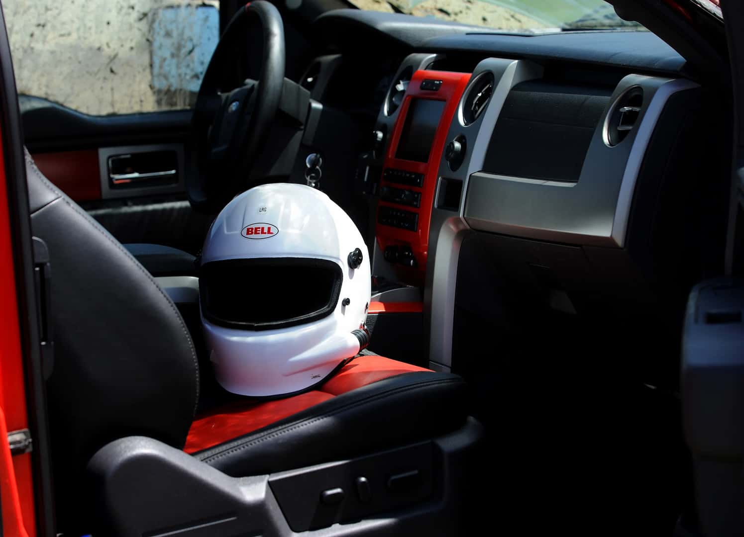 The 2010 F-150 SVT Raptor, equipped with the optional all-new 6.2-liter engine, hitting the woods.